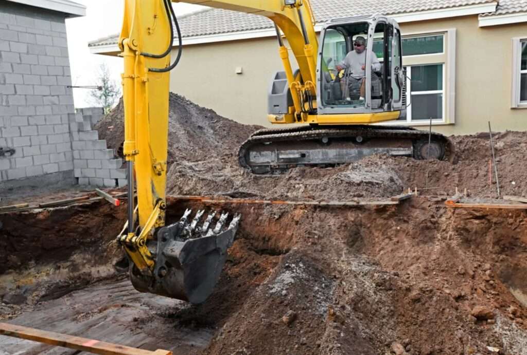 mitchell-pool-excavation Image of excavation work preparing the ground for fiberglass pools installation
