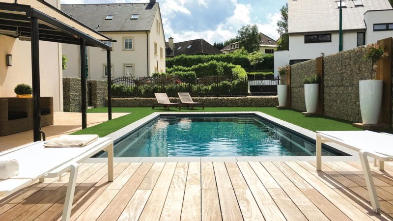 ImaginePools_Freedom_30_VolcanicBlack_US_2018-1-1-800x450 Image of a modern black fiberglass pool with contemporary backyard design